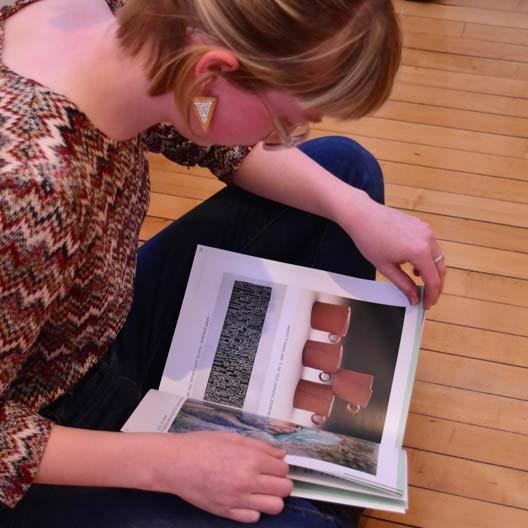 A student reads Loomings Art Magazine